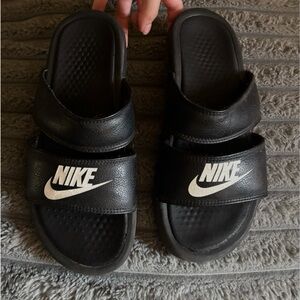 Nike Black Slides with White Swoosh Logo